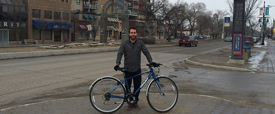 Stéphane Dorge with his bike on the Provencher Boulevard