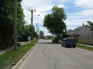 Looking south down Winks towards the intersection of Alexander and Winks (at the traffic circle). A trail connects the southern end of Winks through the Public Works yards to Pacific.